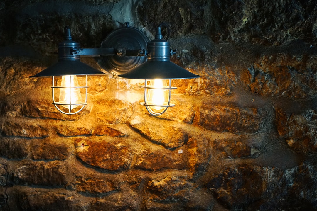 Photo Mediterranean double shade plug in sconce